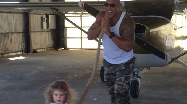 Toddler pulling a plane all by herself – The Rock