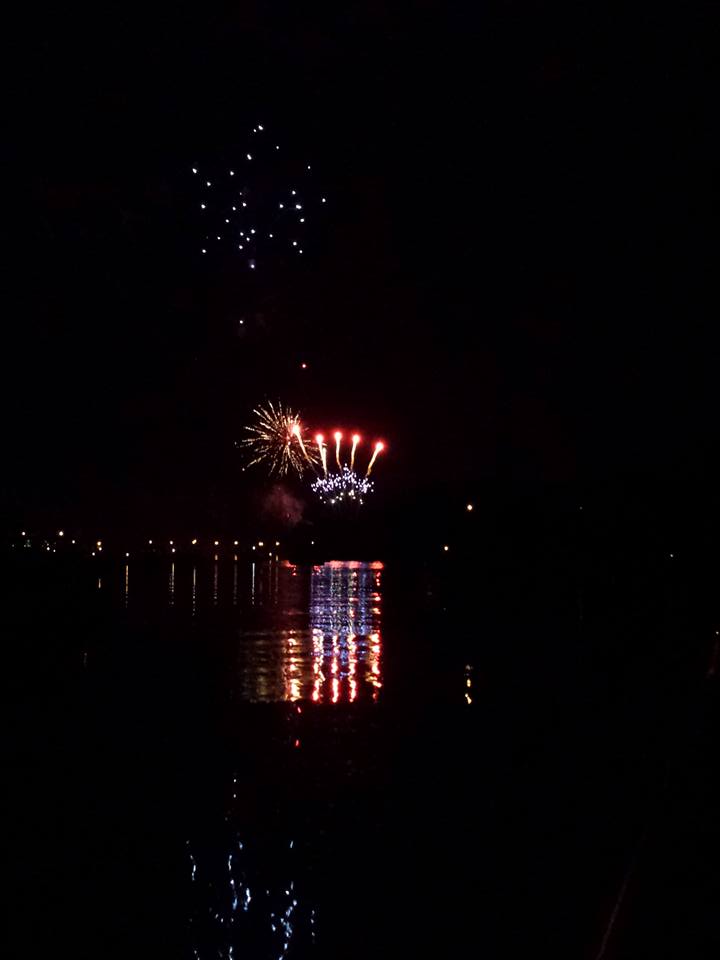 Fireworks reflection on water looks like the American flag