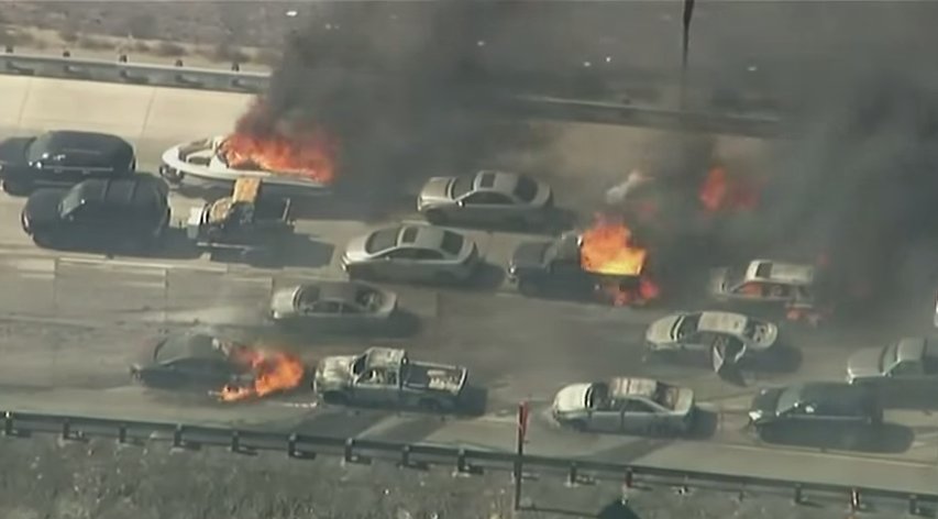 California Wildfire Sweeps Over I-15 Freeway